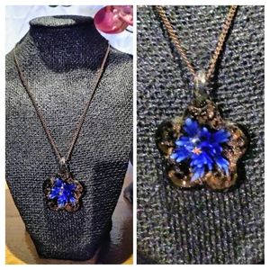 handmade blown glass flower shaped pendant necklace